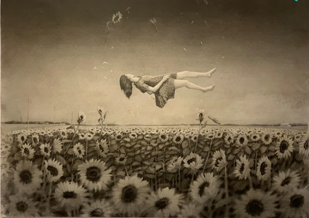 Jonas Brandin-Girl in sunflower field Foto Helena Blomqvist